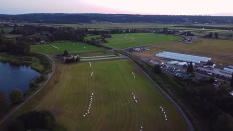 Drone-Flying-Over-Farmland-in-Snohomish-Valley,-Washington