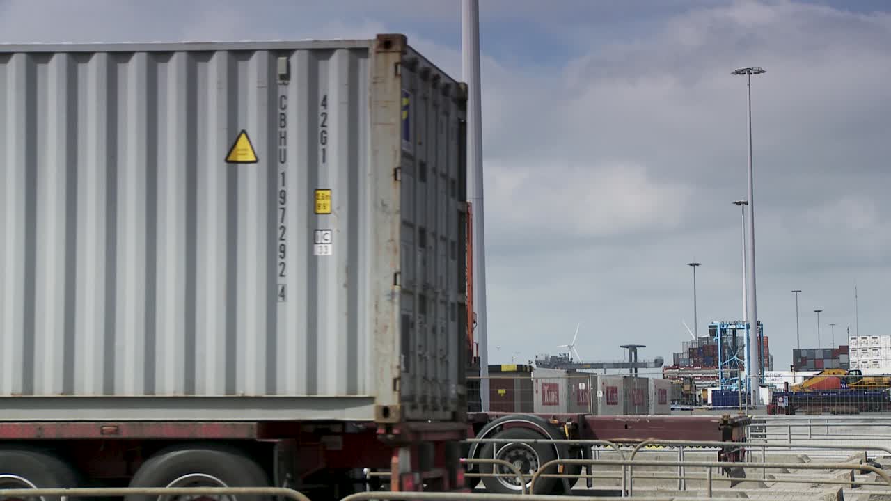 Port view with stacked containers and cranes, Rotterdam port vibe