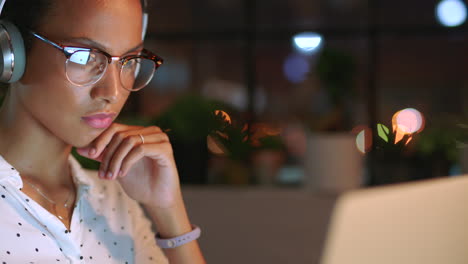 Creative business woman with headphones
