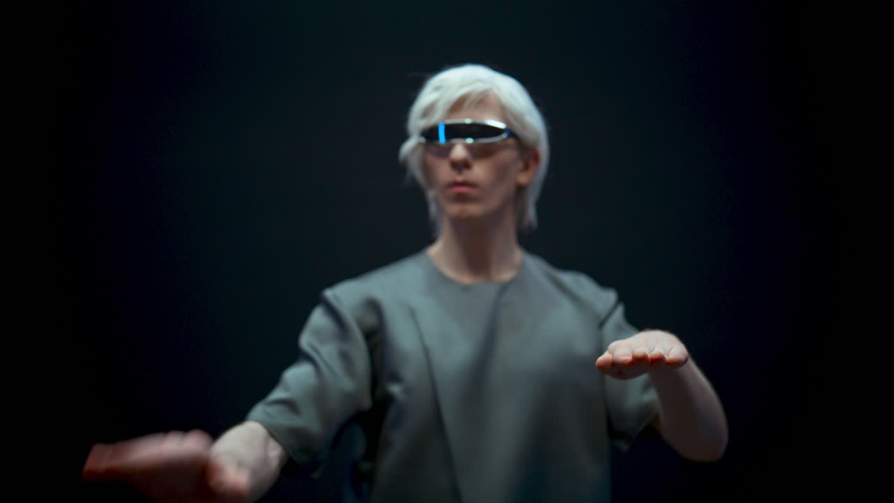 Closeup serious specialist moving invisible objects. High tech metaverse concept