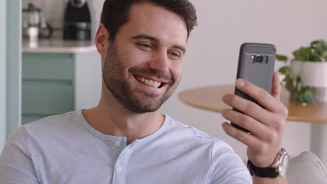 young-deaf-man-having-video-chat-holding-smartphone-using-sign-language-waving-enjoying-connection-chatting-on-mobile-phone