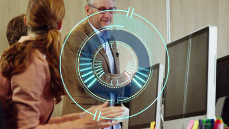 animation of loading circle over happy caucasian diverse colleagues clapping hands in office