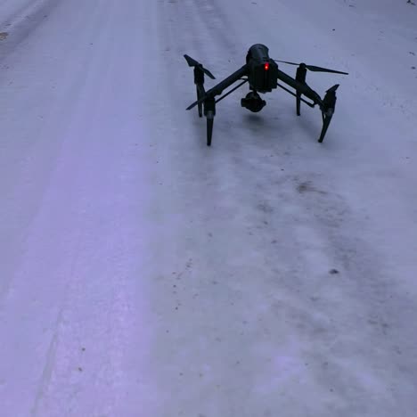 drone flying at winter snowy forest