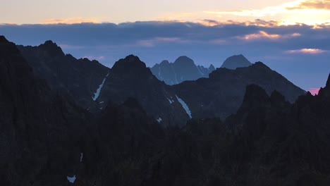 mountain landscape dynamic slow stable drone shot at sunrise in alpine environment and sharp ridges 4