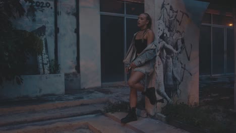 stylish woman smoking in urban setting