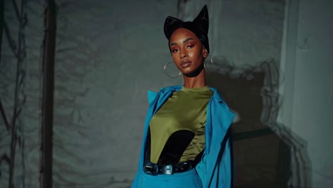 fashion model in teal outfit