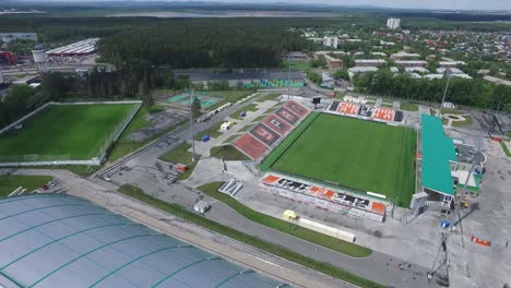 aerial view of a modern sports stadium under construction