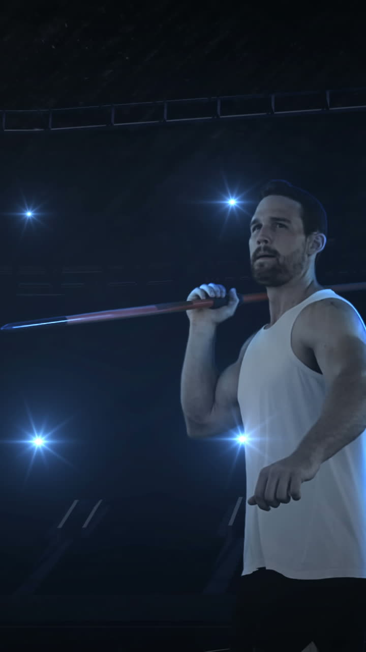 el deportista está practicando el lanzamiento de la jabalina.