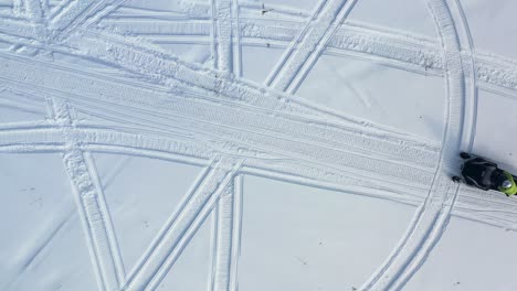 snowmobile tracks in the snow