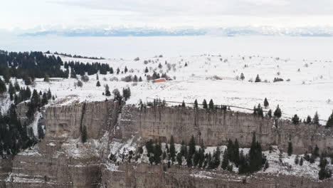 Flying-up-to-mountain-ridge-covered-in-snow