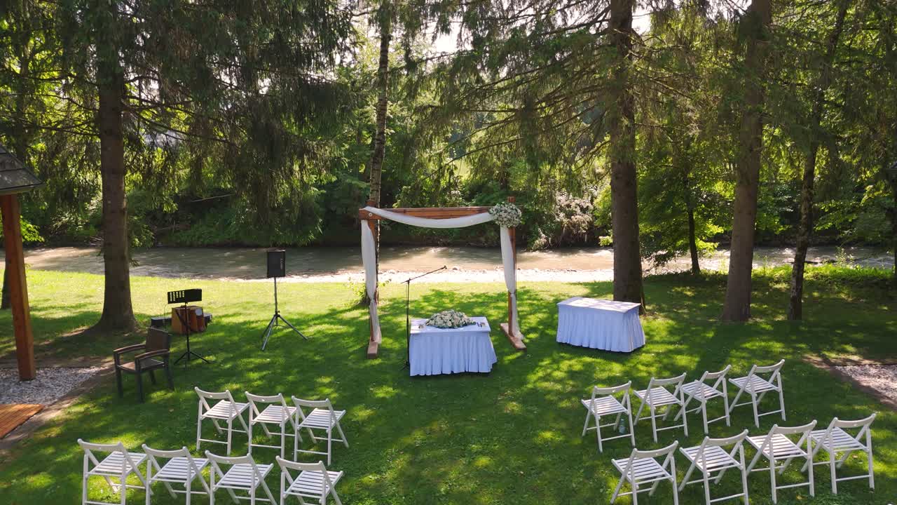 Civil wedding ceremony in a beautiful garden. Aerial view