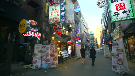 pedestrians in seoul at dawn