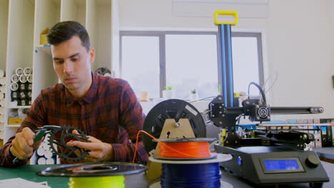 Mechanic-checking-diameter-of-chain-ring-with-vernier-calipers-4k