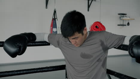 tired boxer in the boxing ring