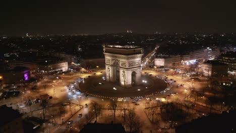 Triumphal-Arch-and-cityscape,-Paris-by-night,-France