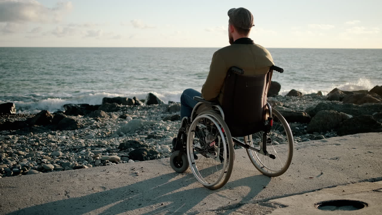 Man in Wheelchair at the Beach