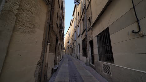 narrow street in the old town of montpellier during covid lockdown