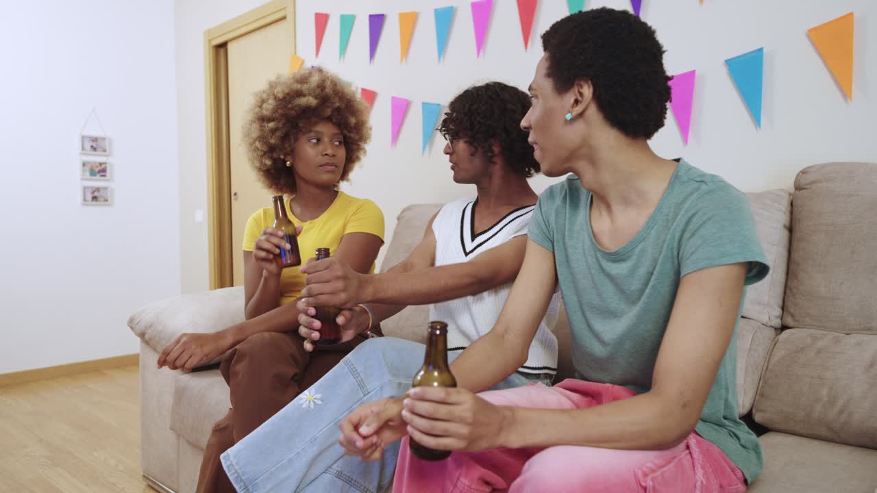 Friends celebrating together with drinks