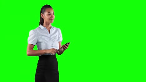 Animation-of-a-mixed-race-woman-in-suit-using-a-phone-in-a-green-background