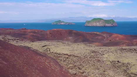 Good-aerial-of-Eldfell-volcano-looming-over-Heimaey-in-the-Westman-Islands-Vestmannaeyjar-Iceland--8