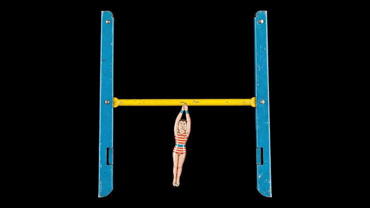 Vintage Illustration of a Woman Swinging on a Horizontal Bar