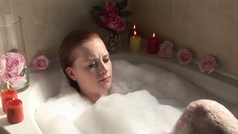 woman relaxing in jacuzzi bath