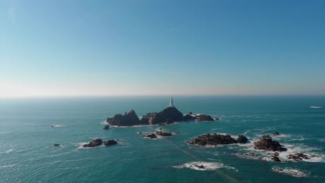 Aerial-Shot-Of-A-Lighthouse-On-a-Sunny-Day