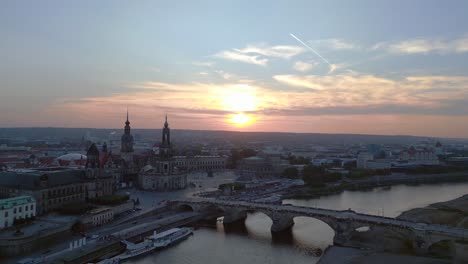 Magic-aerial-top-view-flight-Sunset-city-Dresden-Church-Cathedral-Bridge-River