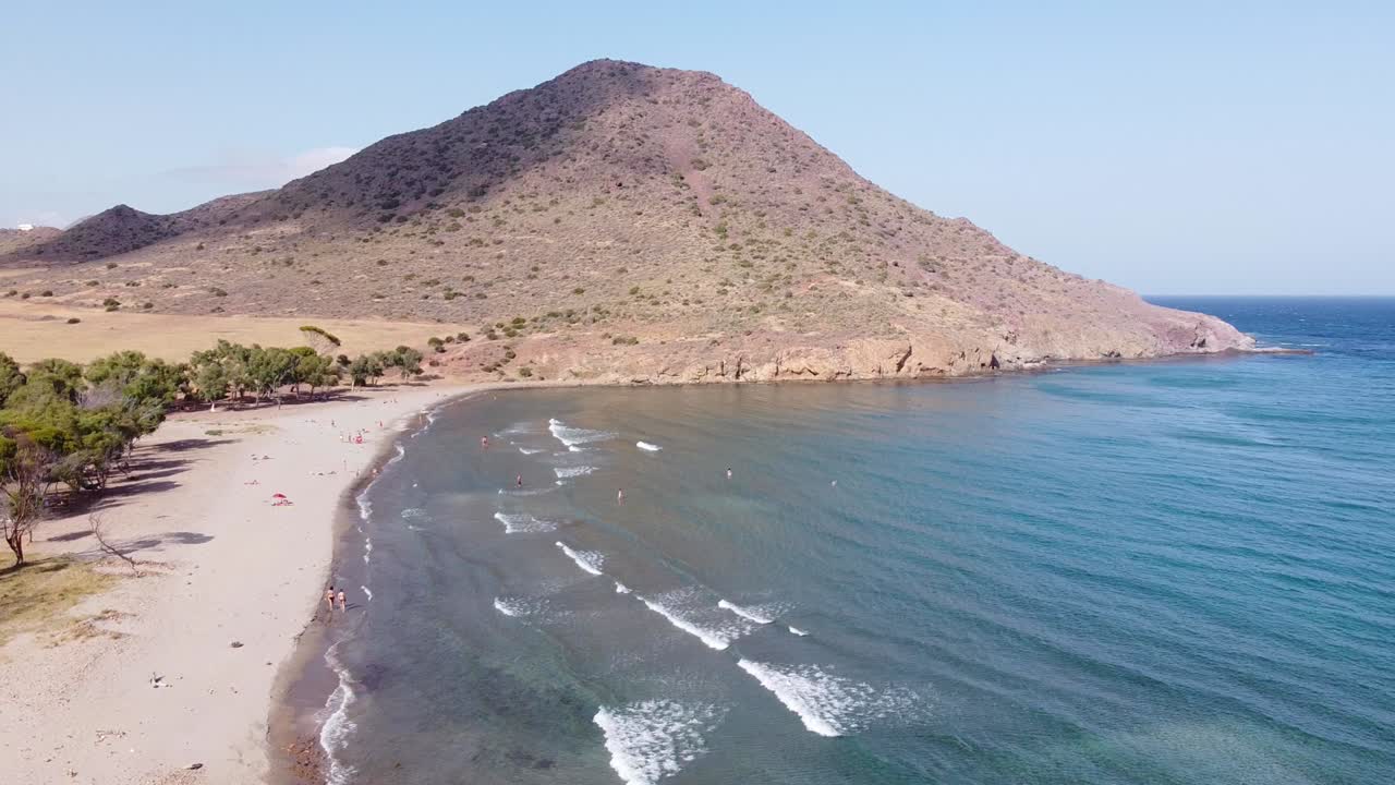 Los Genoveses Beach at Cabo de Gata, Almeria, Andalucia, Spain - Aerial View of Tourists at the Sandy Beach and Vulcanic Landscape