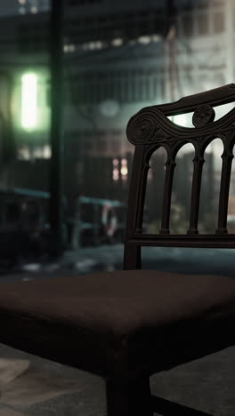 close-up of an old wooden chair in a city at night