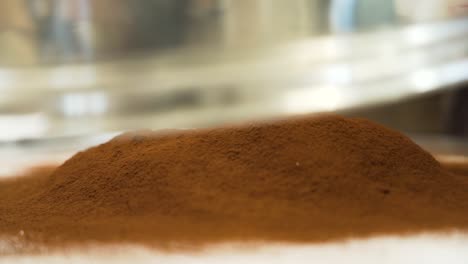 chocolate powder being sprinkled