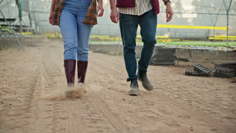 farmers walking in a greenhouse