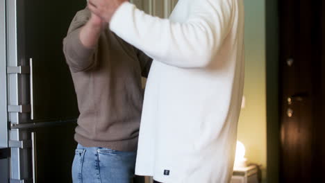 Couple-dancing-at-home