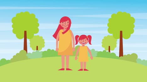 mother and daughter standing in the park