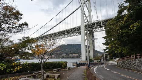 approaching the kanmon bridge and the kanmon strait in between the japanese island honshu and kyushu