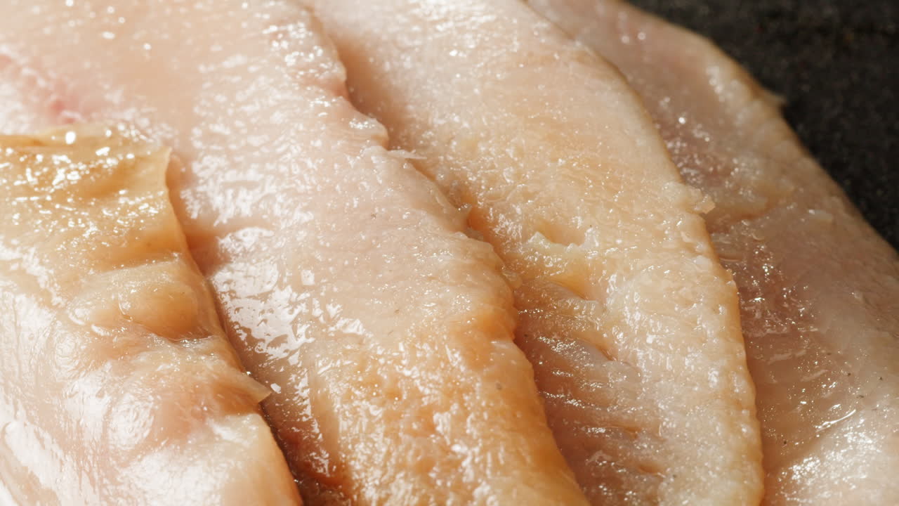Close-up of Raw Fish Fillet Slices