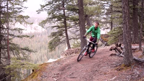 biker riding on trail on a cloudy day