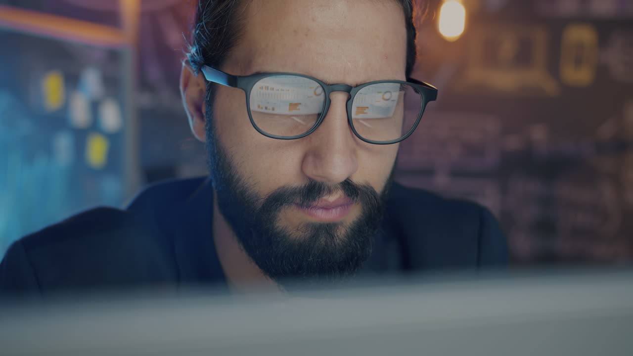 Focused Business Person Working on Computer