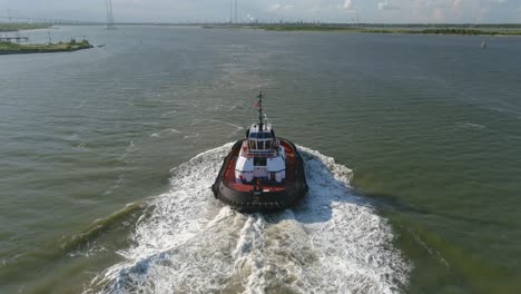 Drone-view-of-tugboat-in-water