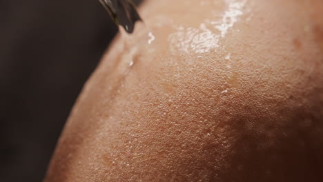 water being poured on skin