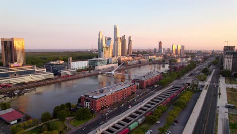 Puerto-Madero-exclusive-site-for-tourists,-docks-full-of-trendy-restaurants-and-waterfront-Skyscrapers,-Aerial-View