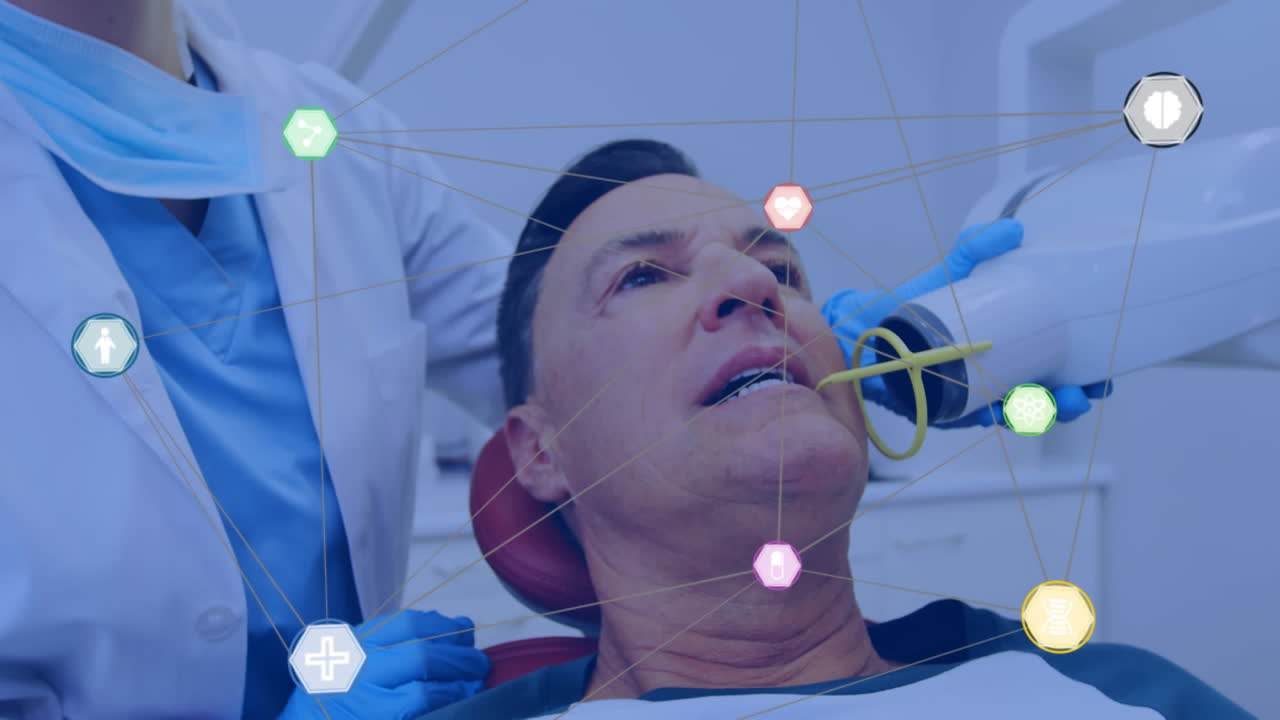 animación de redes de conexiones con iconos sobre el hombre en la silla del dentista