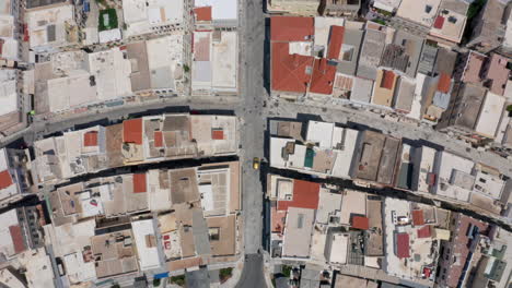 top down drone shot of miaouli square and city hall building in ermoupoli city of syros island, greece during morning hours