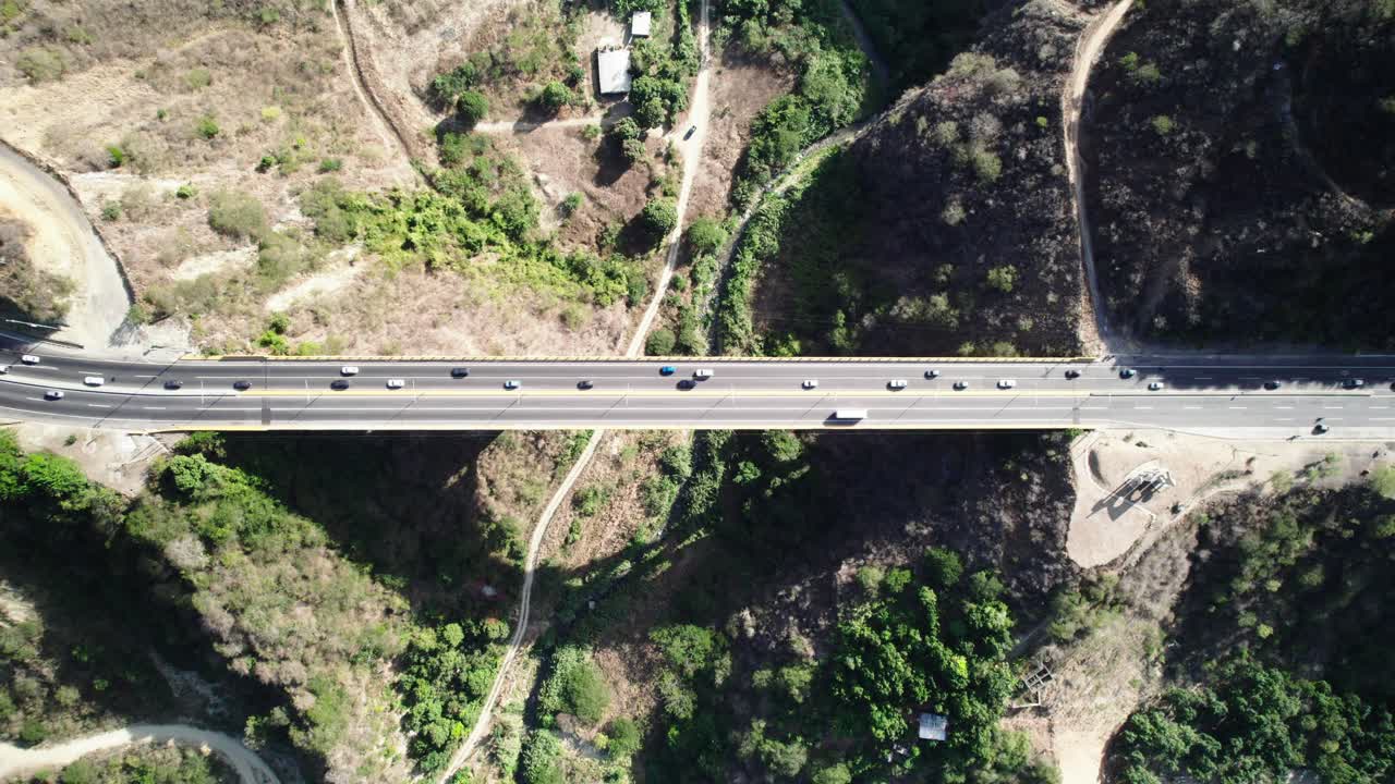 Establishing Aerial Top Down Shot of Caracas La Guaira Highway Viaduct. Modern highway in Latin America, one of the largest made of concrete