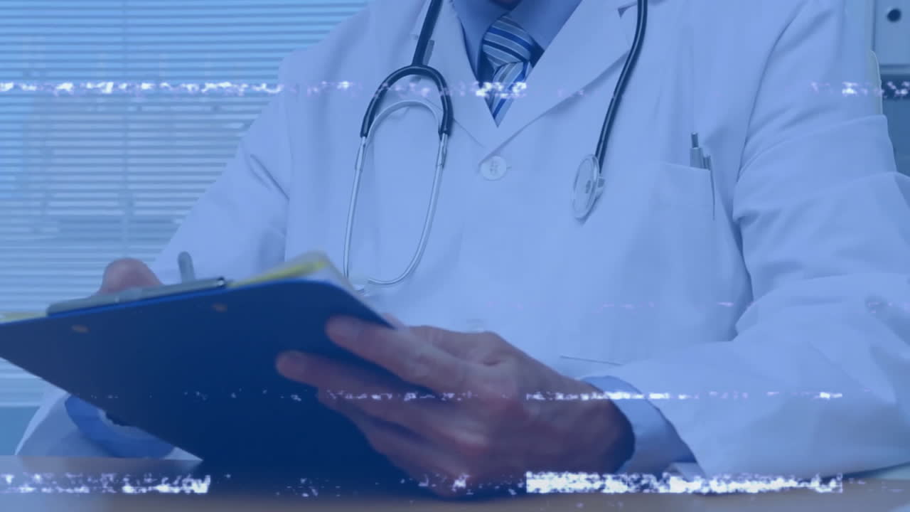 Male doctor noting on clipboard at wooden desk in medical office, with animated glitch lines