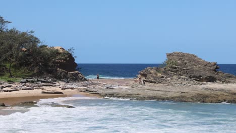 waves gently wash over a tranquil beach