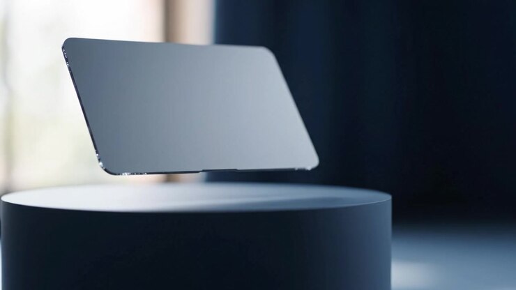 Slankt moderne apparat svævende i luften, der fremviser innovativt design og teknologi med minimalistisk æstetik i blød naturlig belysning og elegant præsentation.