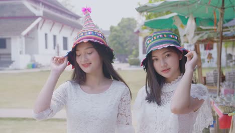 Two Girls Having Fun With Hat, Slow Motion
