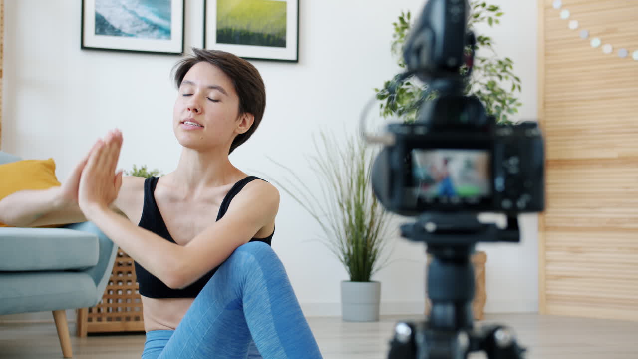 Yoga Instructor Demonstrating Online Workout