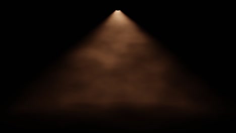 spot light shines through foggy air in front of a black background (seamless loop)